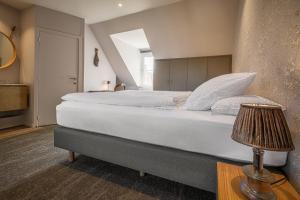 Gulta vai gultas numurā naktsmītnē Guesthouse Gillis7