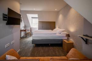 Gulta vai gultas numurā naktsmītnē Guesthouse Gillis7