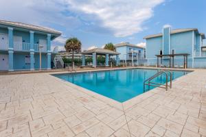 Πισίνα στο ή κοντά στο Portside Villa, No 36 Pet Friendly Beachfront Paradise Retreat