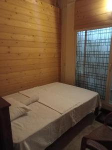 Leopard Rock Family Rest客房内的一张或多张床位