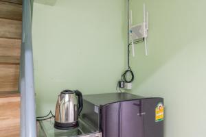 Kuchyň nebo kuchyňský kout v ubytování Cozy Corner Bangpho