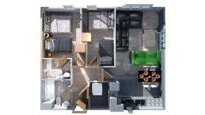 Sidemersey Livings- Convenient and Central 2-Bedroom Haven in L1, Secured Parking في ليفربول: تقديم منزل صغير ذو مخطط ارضي