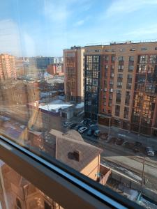 a view of a city from a window at Евро-VIP ЖК Империя in Kokshetau +7 photos