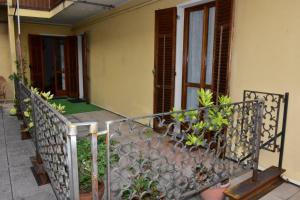 a balcony of a house with plants at Da Alessandro in Biella
