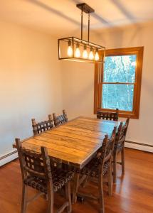 a dining room with a wooden table and chairs at SRC-Hudson Valley, Berkshires Cultural Corridor in Canaan