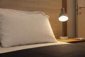 Krevet ili kreveti u jedinici u okviru objekta Balabuska Rooms & Garden