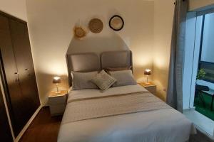 Ένα ή περισσότερα κρεβάτια σε δωμάτιο στο New! Appartement les pieds dans l'eau WELCOME STAY +50 φωτογραφίες