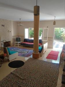 Postel nebo postele na pokoji v ubytování meka privacy quit duplex villa