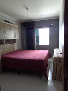 Katil atau katil-katil dalam bilik di AP no Areias Camboriú +7 gambar