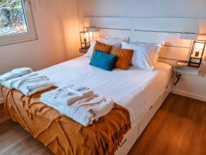 Giường trong phòng chung tại Casa da Ponta Negra
