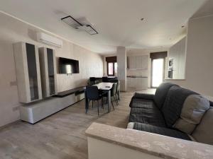 a living room with a couch and a table at Casa Vacanza da Patty in San Rufo