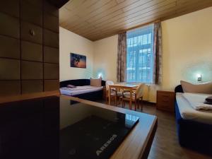 a living room with a couch and a table at Haus Savina in Weimar