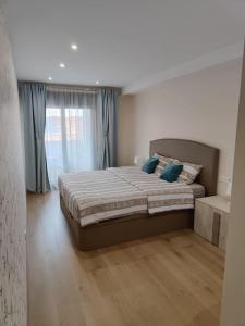 En eller flere senge i et værelse på Apartment mit Pool und Parking nähe Playa del Cura, Torrevieja