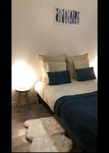 Postel nebo postele na pokoji v ubytování L'Escale Marine