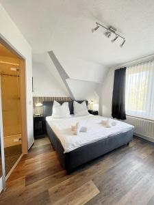 Postel nebo postele na pokoji v ubytování Hotel Marina