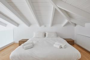 Posteľ alebo postele v izbe v ubytovaní Clock Tower Aparthotel