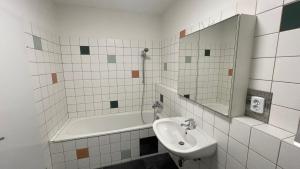 Koupelna v ubytování Wunderschöne Stadtwohnung + 7 fotografií