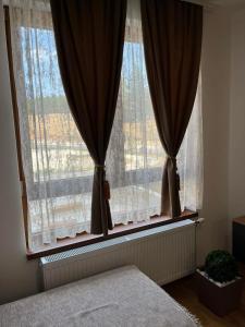 Ένα ή περισσότερα κρεβάτια σε δωμάτιο στο DivčiNova Cerovac