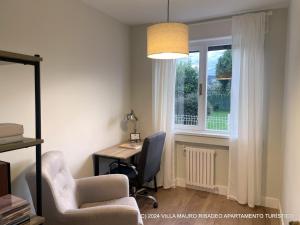 Część wypoczynkowa w obiekcie Villa Mauro Ribadeo Apartamento Turístico