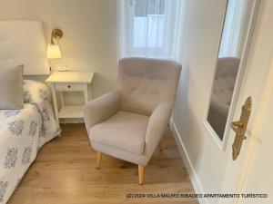 Łóżko lub łóżka w pokoju w obiekcie Villa Mauro Ribadeo Apartamento Turístico
