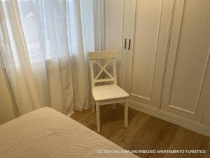 Łóżko lub łóżka w pokoju w obiekcie Villa Mauro Ribadeo Apartamento Turístico