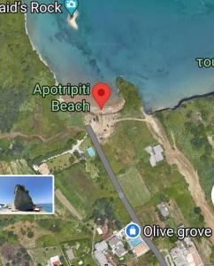 a map of a beach with a red heart at olivegrove in Sidari