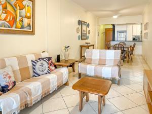 Coin salon dans l'établissement Apto 3 quartos, 100m da praia, piscina e churrasqueira