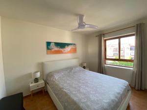 Postel nebo postele na pokoji v ubytování Sunrise Albir