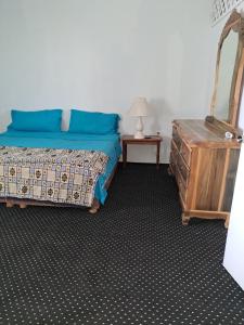 Cama ou camas em um quarto em 102 relax