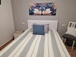 Postel nebo postele na pokoji v ubytování Habitaciones Zoe