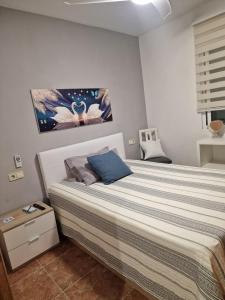 Postel nebo postele na pokoji v ubytování Habitaciones Zoe
