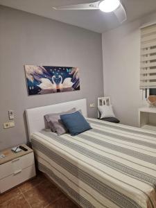 Postel nebo postele na pokoji v ubytování Habitaciones Zoe