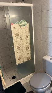 Koupelna v ubytování Kitnet Flamingo 31B