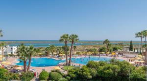 a view of the pool at a resort at Apartamento Golden Naimara in Cabanas de Tavira