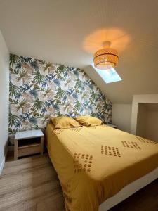 Ένα ή περισσότερα κρεβάτια σε δωμάτιο στο Appartement T2