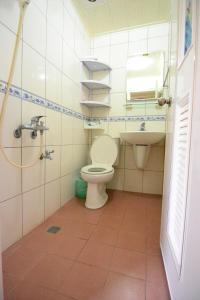 Koupelna v ubytování Haichian Hostel