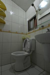 Koupelna v ubytování Haichian Hostel