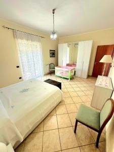 Postel nebo postele na pokoji v ubytování Villa Adriana alle pendici dell'Etna