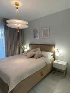 Postel nebo postele na pokoji v ubytování Flamenca Village + 24 fotografií