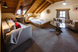 Postel nebo postele na pokoji v ubytování Hotel Frýdl