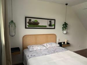 Postel nebo postele na pokoji v ubytování Tiki Ora lodge - Moana