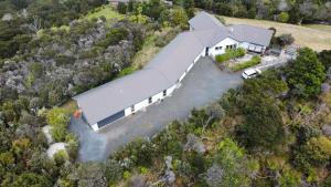 an aerial view of a home with a building at Russell's Secluded Secret in Russell