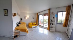 Predel za sedenje v nastanitvi Le Belvédère - Studio Lumineux - Vue & Terrasse