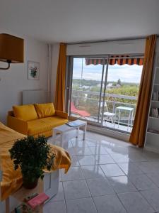 Posezení v ubytování Le Belvédère - Studio Lumineux - Vue & Terrasse