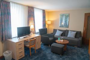 Μια τηλεόραση ή/και κέντρο ψυχαγωγίας στο Hotel zum Grafen Hallermunt