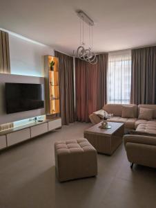 TV a/nebo společenská místnost v ubytování Serendipity Apartment Lungomare