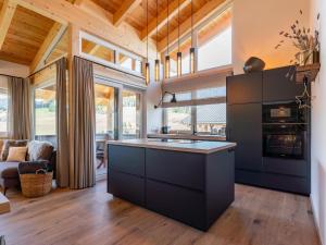 Kuchyň nebo kuchyňský kout v ubytování Grebenzen Lodge 1028
