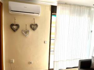 Televízia a/alebo spoločenská miestnosť v ubytovaní Moderno y acogedor apartamento para 6 personas
