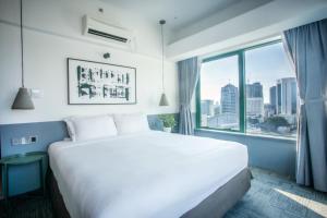 Postel nebo postele na pokoji v ubytování Z HOTEL + 37 fotografií