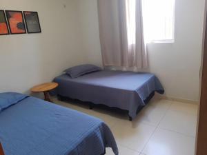 En eller flere senge i et værelse på Solaris praia, Apê amplo e aconchegante em Luís Correia PI